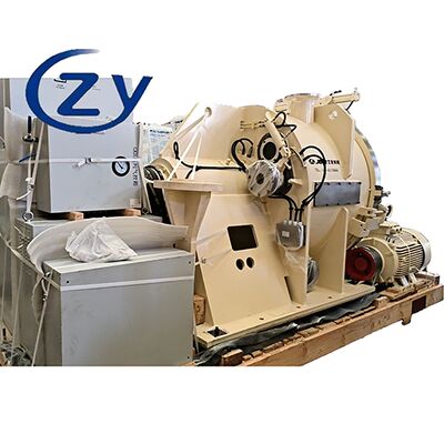 Низкоэнергетическая скребковая центрифуга с улучшенным разделением твердой и жидкой фаз